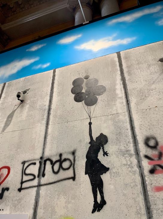 Flying Balloon Girl in The World of Banksy Torino